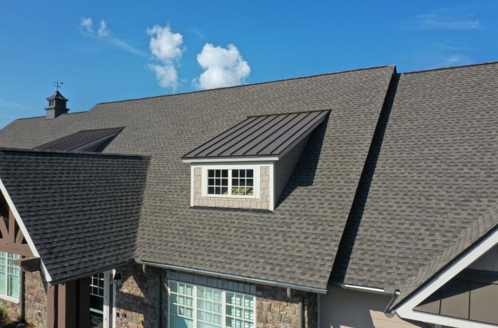 A Kings Roofing & Contracting team member working on residential roofing in Boise, ID, showing quality and reliable service.