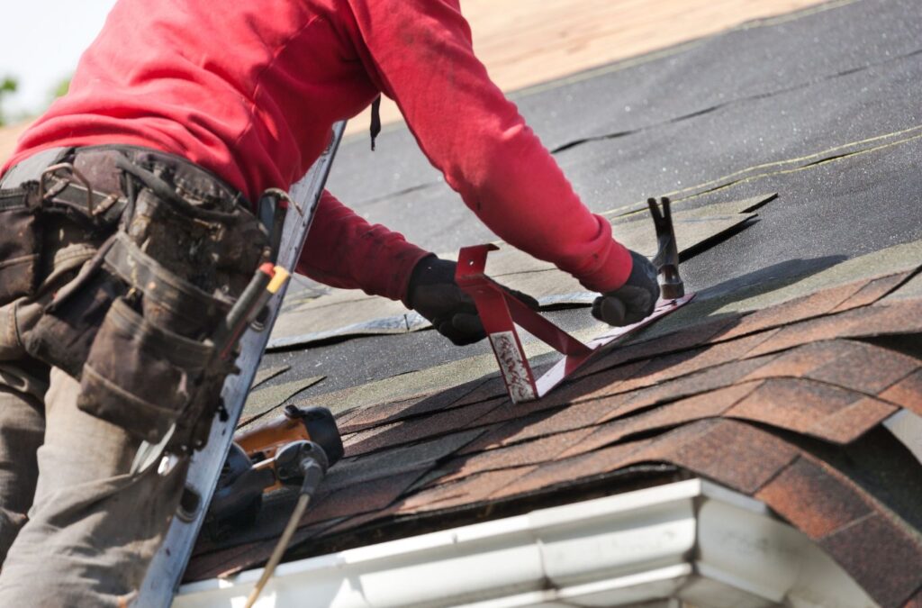 A Kings Roofing & Contracting expert installing roofing materials in Boise, ID, showing local skill and attention to detail. Roof Installation near me.