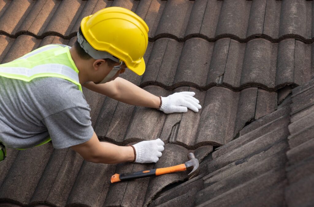 A Kings Roofing & Contracting roofer fixing shingles in Nampa, ID, showing trusted local service and expert craftsmanship. Roof Repair near me.