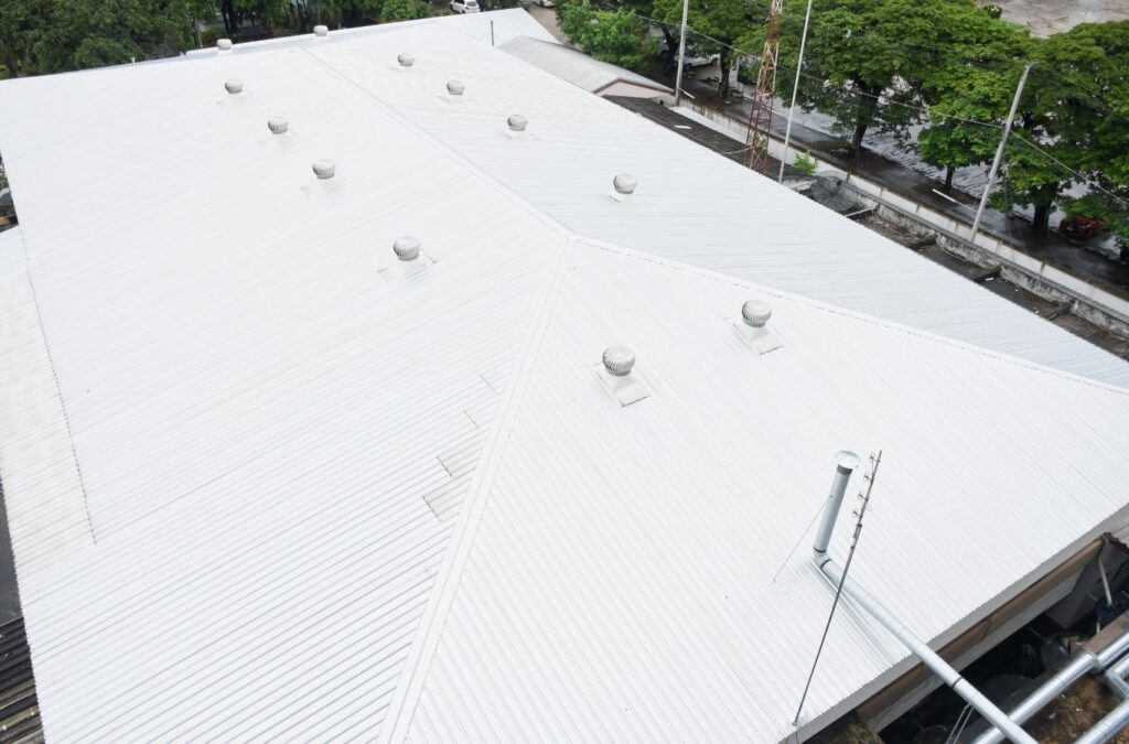 A Kings Roofing & Contracting team member working on commercial roofing in Star, ID, showing the value of skilled installation for local businesses.