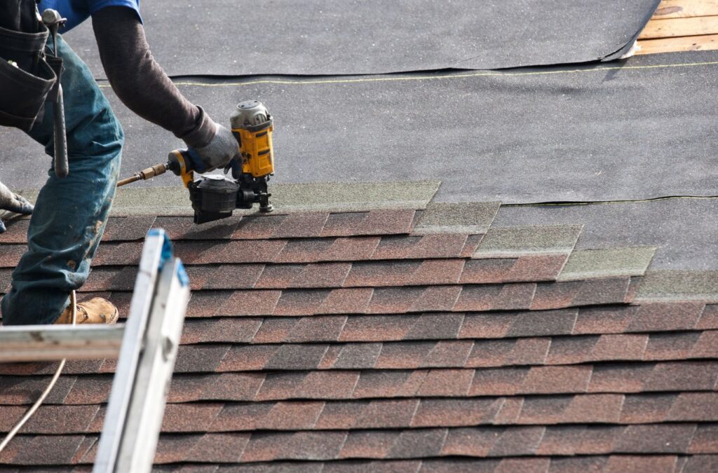 A Kings Roofing & Contracting specialist carrying out roof installation in Nampa, ID, showcasing quality, professionalism, and reliability. Roof Installation near me.