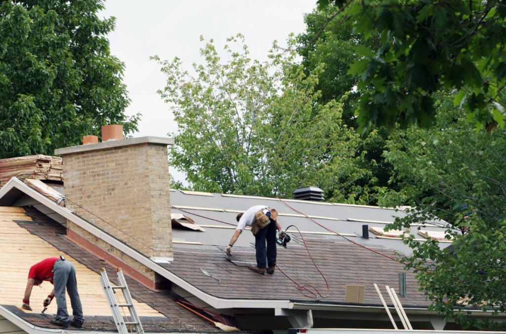 A Kings Roofing & Contracting roofer securing shingles on a McCall, ID property, ensuring durability and dependable long-term roof performance.